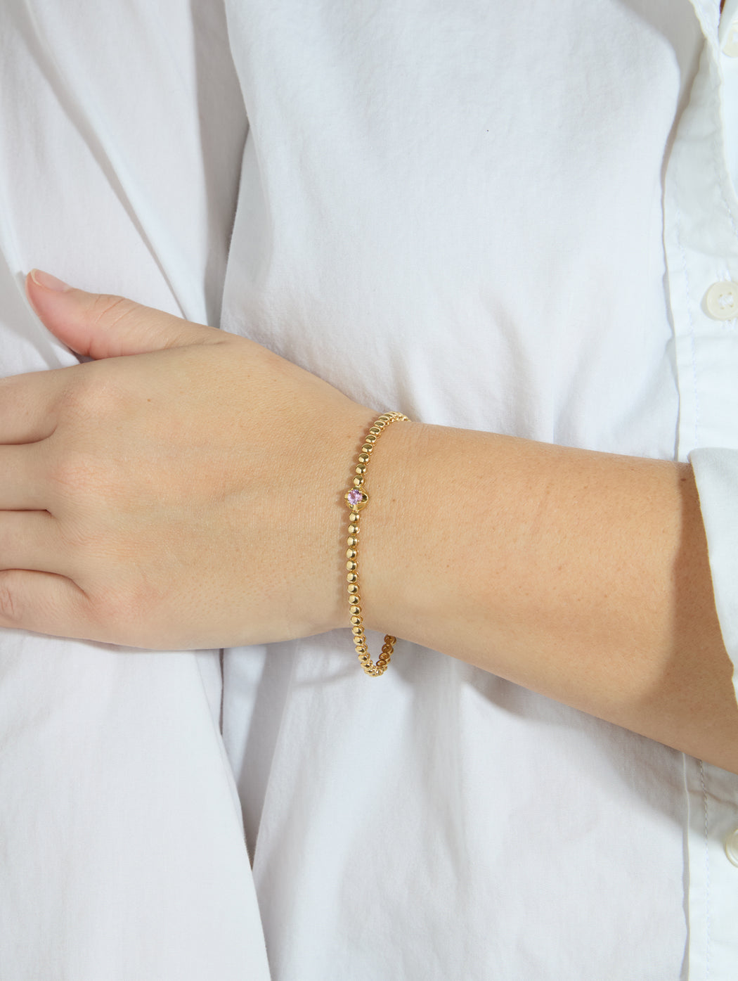 Mini Bezel Yellow Gold Tennis Bracelet with Illusion Set Pink Sapphire